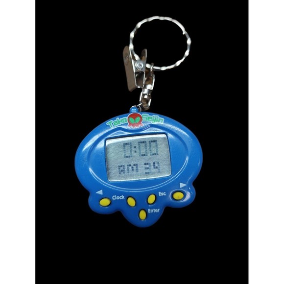 VTG Tako Seijin Tamagotchi Type Handheld Keychain Alien Virtual Pet Blue - Picture 1 of 3